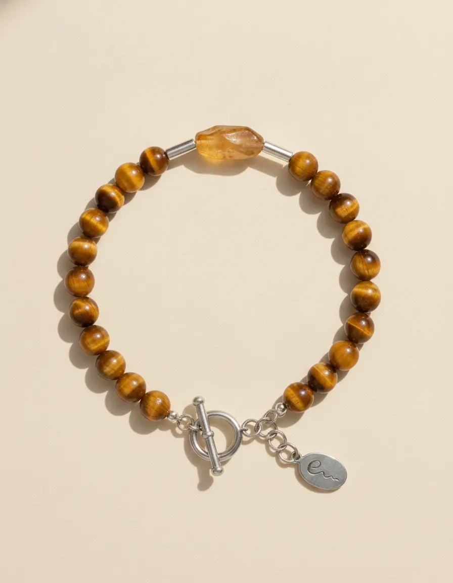 Earth bracelet Ochre, beaded with toggle clasp and River E tag on ivory