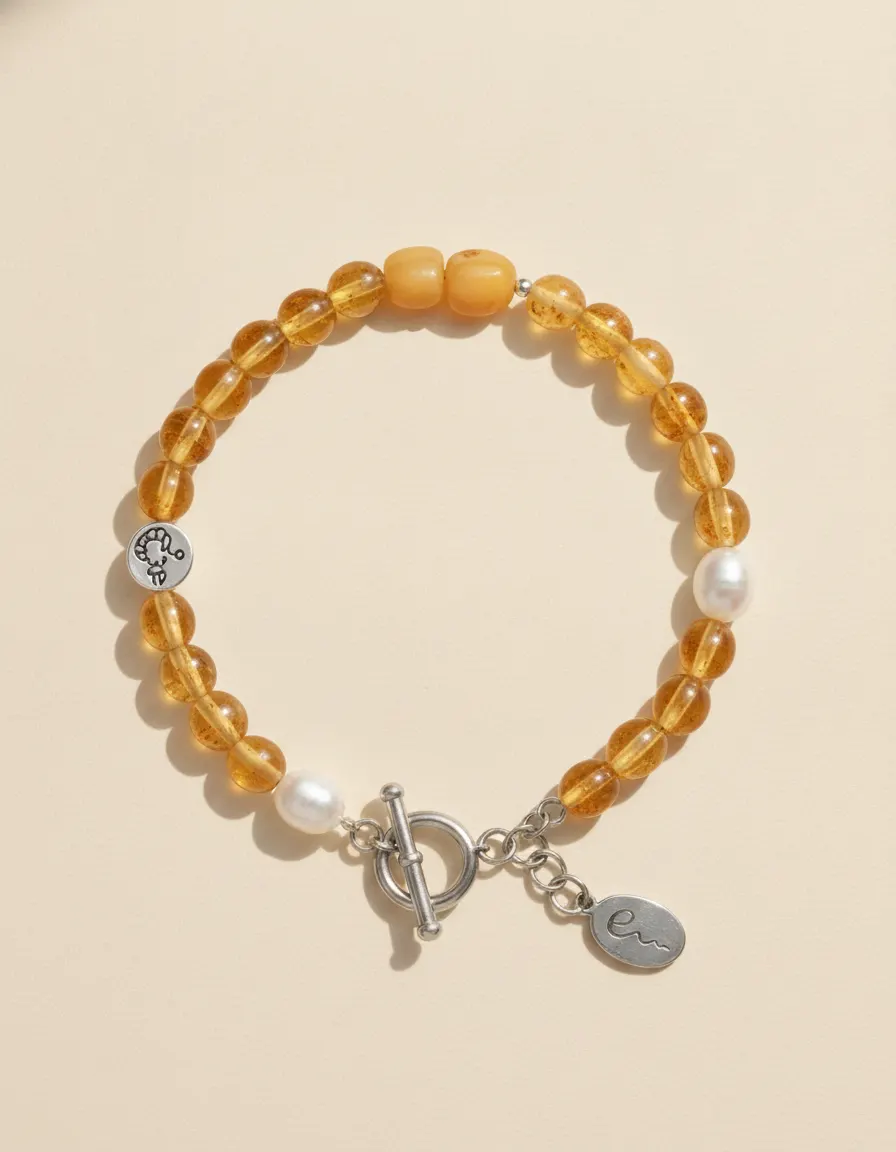 Earth bracelet Waxlight, beaded with toggle clasp and River E tag on ivory