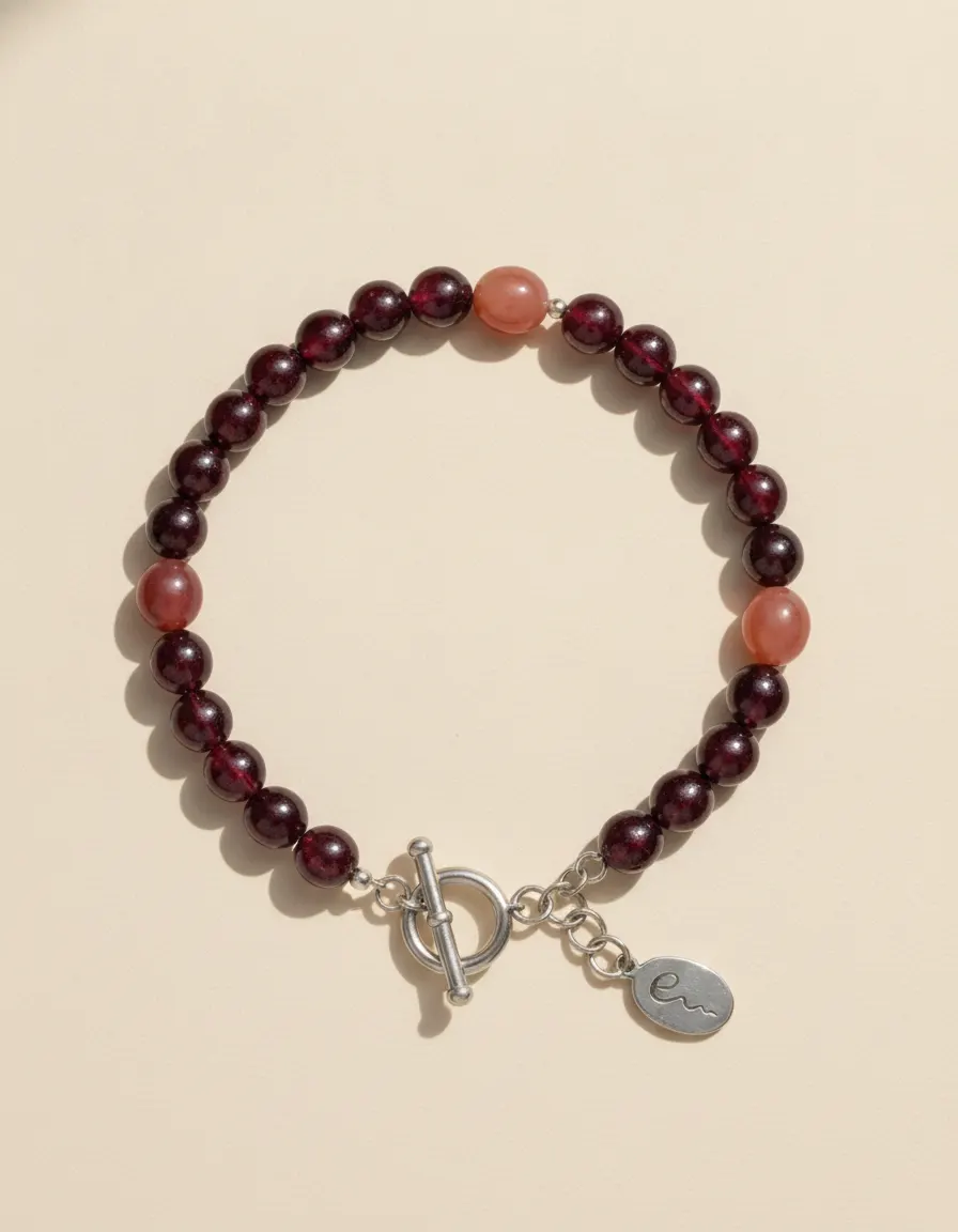 Fire bracelet Coalglow, beaded with toggle clasp and River E tag on ivory