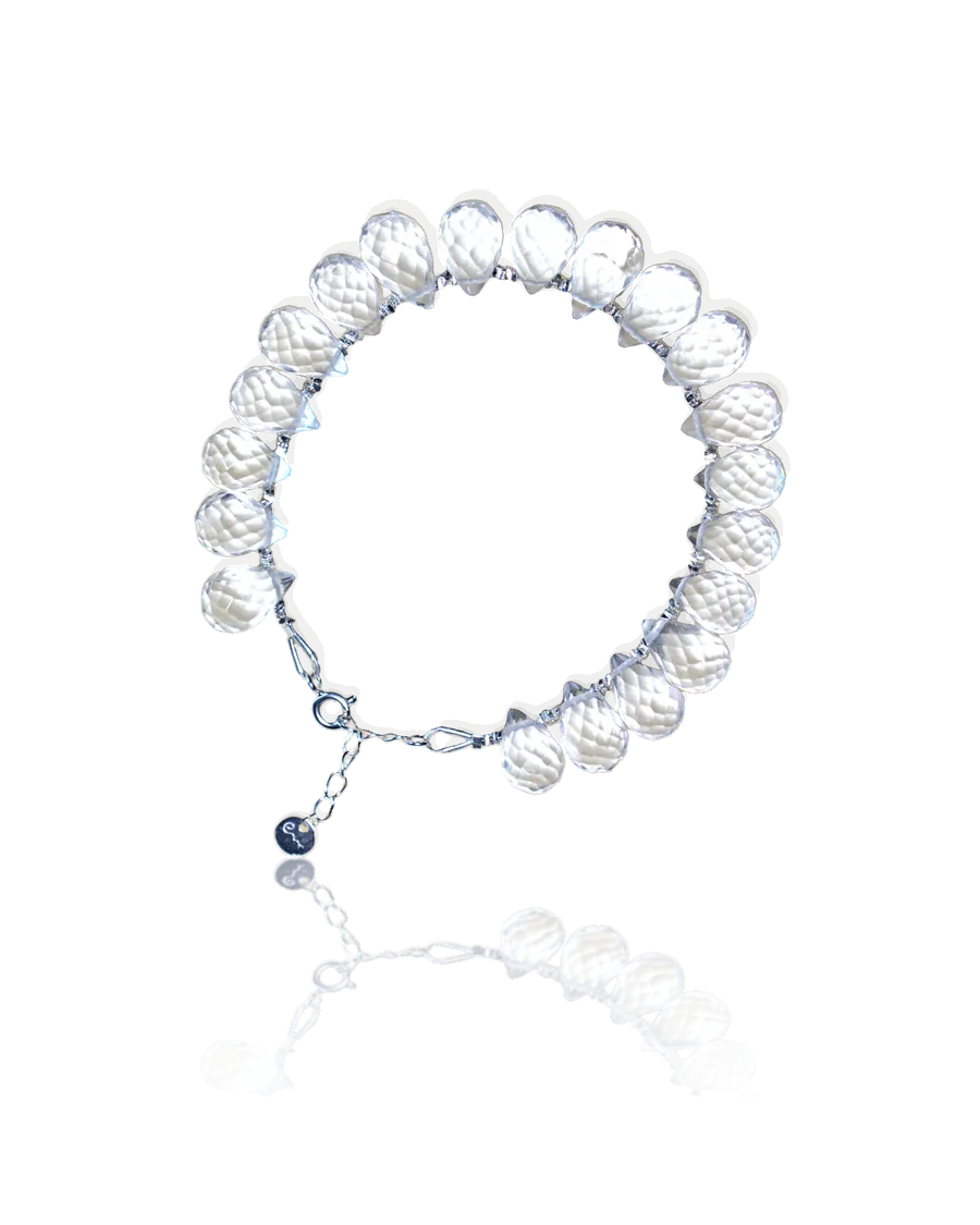 Metal bracelet: clear faceted teardrop stones on a silver chain with a spring-ring clasp and River E tag